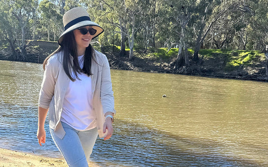 Felicity wears a Solbari sun hat and luxe sun wrap